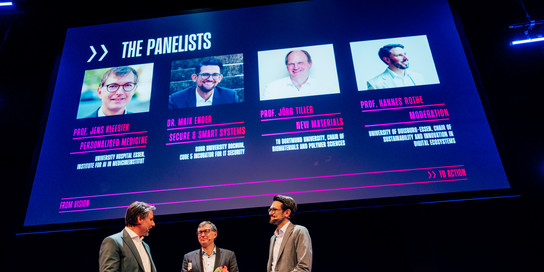 Panelists BRYCK KickOff Drei Menschen auf einer Bühne.
