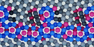 Illustration: The figure shows red, blue, purple and gray spheres. These represent one of the predicted grain boundary phases depending on the increasing Fe segregation. The Fe atoms are shown in red, all other colors correspond to Ti.