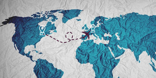 World map in the style of a print on crumpled fabric with a flight route from New York to the Ruhr area marked on it