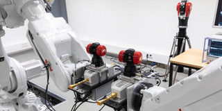 Robot-assisted THz laboratory for micrometer-precise material measurement and localization