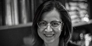 Photo: A black and white portrait of Dana Branzei