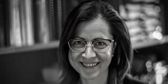 Photo: A black and white portrait of Dana Branzei