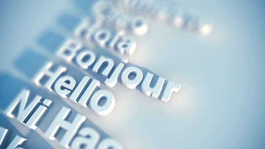 Stockfoto mit den Begrüßungswörtern "Hola", "Bonjour" und "Hello".